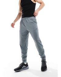 Nike - – totality dri-fit – schmal zulaufende jogginghose - Lyst