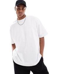 ASOS - T-shirt oversize pesante bianca con risvolto sulle maniche - Lyst