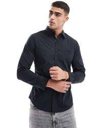 Levi's - Battery Batwing Logo Slim Fit Poplin Shirt - Lyst