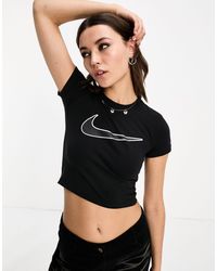 Nike - Streetwear - t-shirt nera ristretta - Lyst