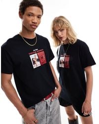 ASOS - T-shirt unisex oversize nera con stampa di dua lipa su licenza sul davanti - Lyst