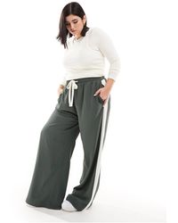 ASOS - Pantalones s sin cierres con panel en contraste - Lyst