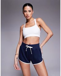 4505 - Icon Soft Touch Medium Support Soft Touch Square Neck Sports Bra - Lyst