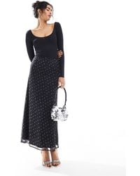 Miss Selfridge - Jupe longue coupe en biais à imprimé fleurs - Lyst