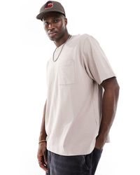 Abercrombie & Fitch - Camiseta marrón grisáceo con bolsillo - Lyst