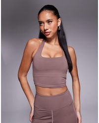 4505 - Halter Neck Performance Vest With Inner Bra - Lyst