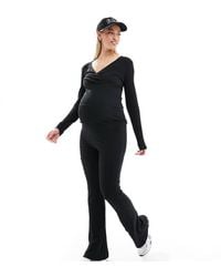 Mama.licious - Mamalicious Maternity Flared Over The Bump Jersey Trouser Co-Ord - Lyst
