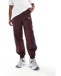 Nike - Swoosh Air Woven Joggers - Lyst