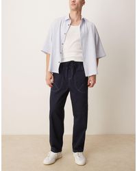ASOS - Pantalon baggy en nylon avec coutures contrastantes - Lyst