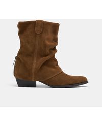 Stradivarius - Leder-slouchy-stiefel im kuhstil mit mittelhohem absatz - Lyst