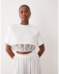 Noughts & Kisses - Top Met Schoudervullingen En Kanten Korsettaille - Lyst
