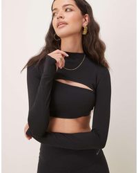 Nike - Top Con Bolero De Manga Larga De Tejido Suave Dri-Fit Zenvy De - Lyst