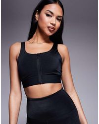4505 - Icon Active High Support Sports Bra With Removable Padding And Adjustable Straps - Lyst