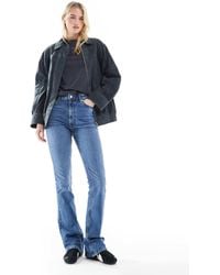 ASOS - Asos Design Tall Mid Rise Flare Jeans - Lyst