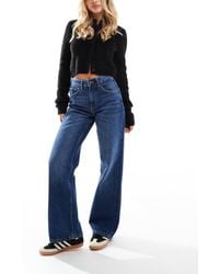 Bershka - Petite - jean large à taille haute style années 90 - foncé délavé - Lyst
