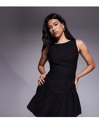 The Frolic - Exclusive Bengaline Sleeveless Slash Neck Hip Pleat Detail Mini Dress - Lyst