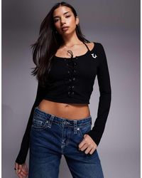 TRUE RELIGION - Long Sleeve Ribbed Top With Halter Neck And Lace Up Detail - Lyst