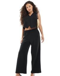 Only Petite - Pantalones De Sastre Negros De Corte Suelto Con Detalle De Cinta De (Parte De Un Conjunto) - Lyst