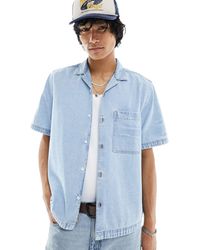 ASOS - Camisa vaquera azul holgada con lavado claro y cuello - Lyst