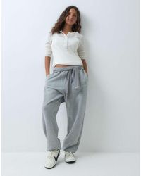 Nike - Studio Fleece Mid-weight Oversized Cuffed joggers - Lyst