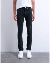 TOPMAN - Vaqueros Negro Lavado Elásticos De Corte Pitillo De - Lyst
