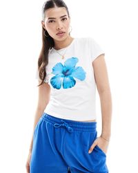 ASOS - T-shirt court à imprimé fleur d'hibiscus bleue - Lyst