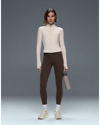 Oysho - Short Light Warm Technical Jacket - Lyst