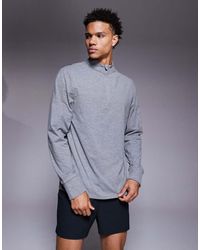 4505 - Running Thermal Interlock Quarter Zip Long Sleeve Training Top - Lyst