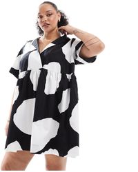 ASOS - Asos design curve - robe chemise courte à imprimé tacheté avec col à revers et ourlet style corset - noir et blanc - Lyst