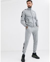 tuta puma nera e bianca