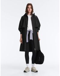 Oysho - Giacca Impermeabile Lunga Super Leggera 10K Nera - Lyst
