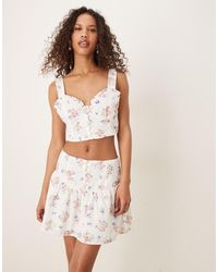 Collective The Label - Drop Waist Mini Skirt - Lyst