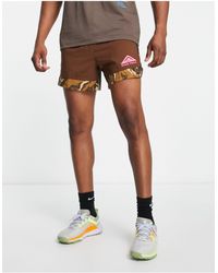 Nike - – trail flex stride dri-fit – gemusterte lauf-shorts - Lyst