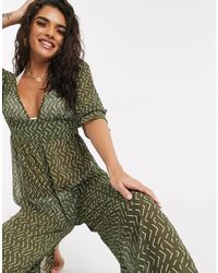 next green geo jumpsuit