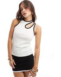 SELECTED - Camiseta negra asimétrica sin mangas con ribetes blancos - Lyst