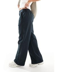 Nike - – msc – weit geschnittene hose aus twill - Lyst