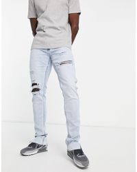 Hollister Stacked - jeans skinny con strappi e rammendi lavaggio chiaro - Blu