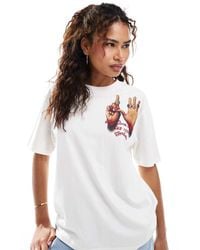 Nike - Camiseta Blanca Con Estampado Gráfico De Anillos En La Espalda De - Lyst
