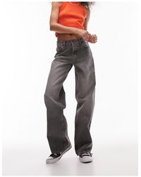 TOPSHOP - Ember - jeans a fondo ampio e vita bassa sporco - Lyst