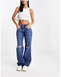 Hollister - Jeans extra larghi a vita bassa vintage lavaggio medio - Lyst