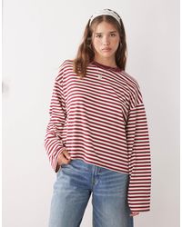 Lioness - – bloom – langärmliges, kastiges t-shirt aus baumwollmix mit rundhalsausschnitt und streifen - Lyst