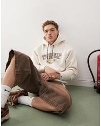 Aape By A Bathing Ape - Aape by a bathing ape - sweat à capuche avec logo et imprimé au dos - beige - Lyst