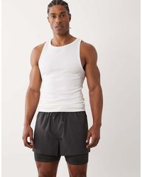 4505 - 2-in-1 Quick Dry Woven Running Shorts With Zipper Pockets - Lyst