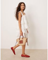ASOS - Mini-jupe d'ensemble à volants et ourlet brodé - Lyst