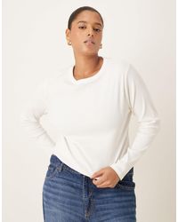 ASOS - Asos design curve - top côtelé à manches longues et col ras - Lyst