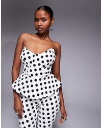 AFRM - Merida Structured Corset Peplum Top - Lyst