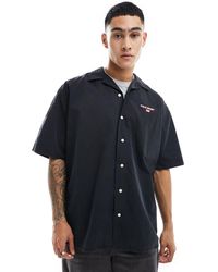 Polo Ralph Lauren - Camisa negra extragrande con bolsillo y logo - Lyst