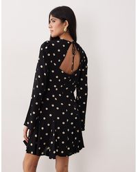 Nobody's Child - Paris Cut Out Back Fluted Hem Mini Dress - Lyst