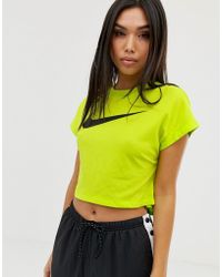 Nike T-shirt court à logo virgule - Jaune fluo