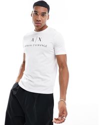 Armani Exchange - T-shirt slim fit bianca con logo sul petto - Lyst